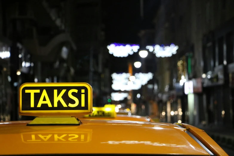 a taxi cab on a city street at night, by irakli nadar, pexels contest winner, hyperrealism, square, banner, turkey, medium close up shot