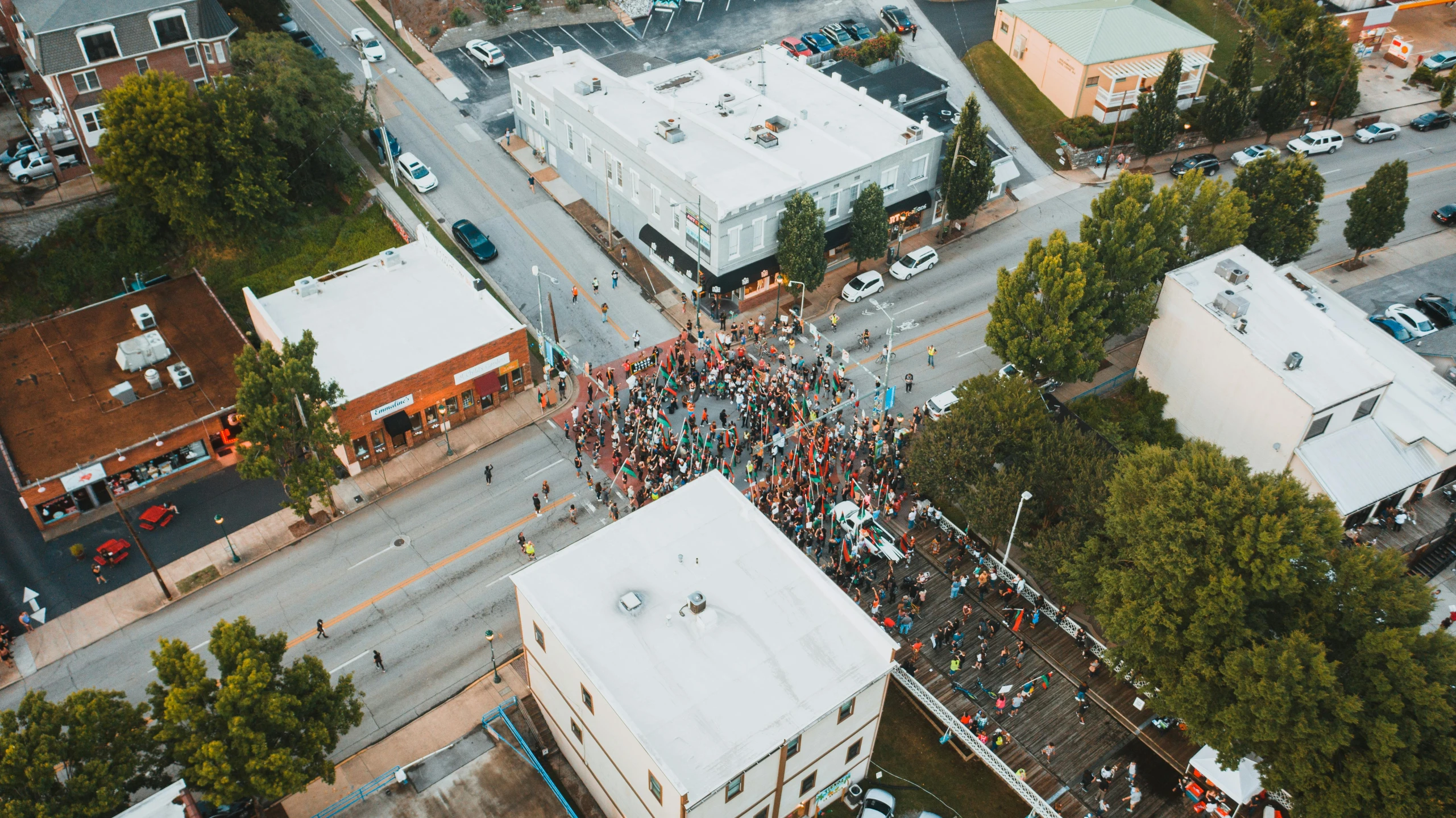 a crowd of people standing on top of a city street, by Andrew Stevovich, unsplash contest winner, renaissance, bentonville arkansas, marathon race, aerial, square