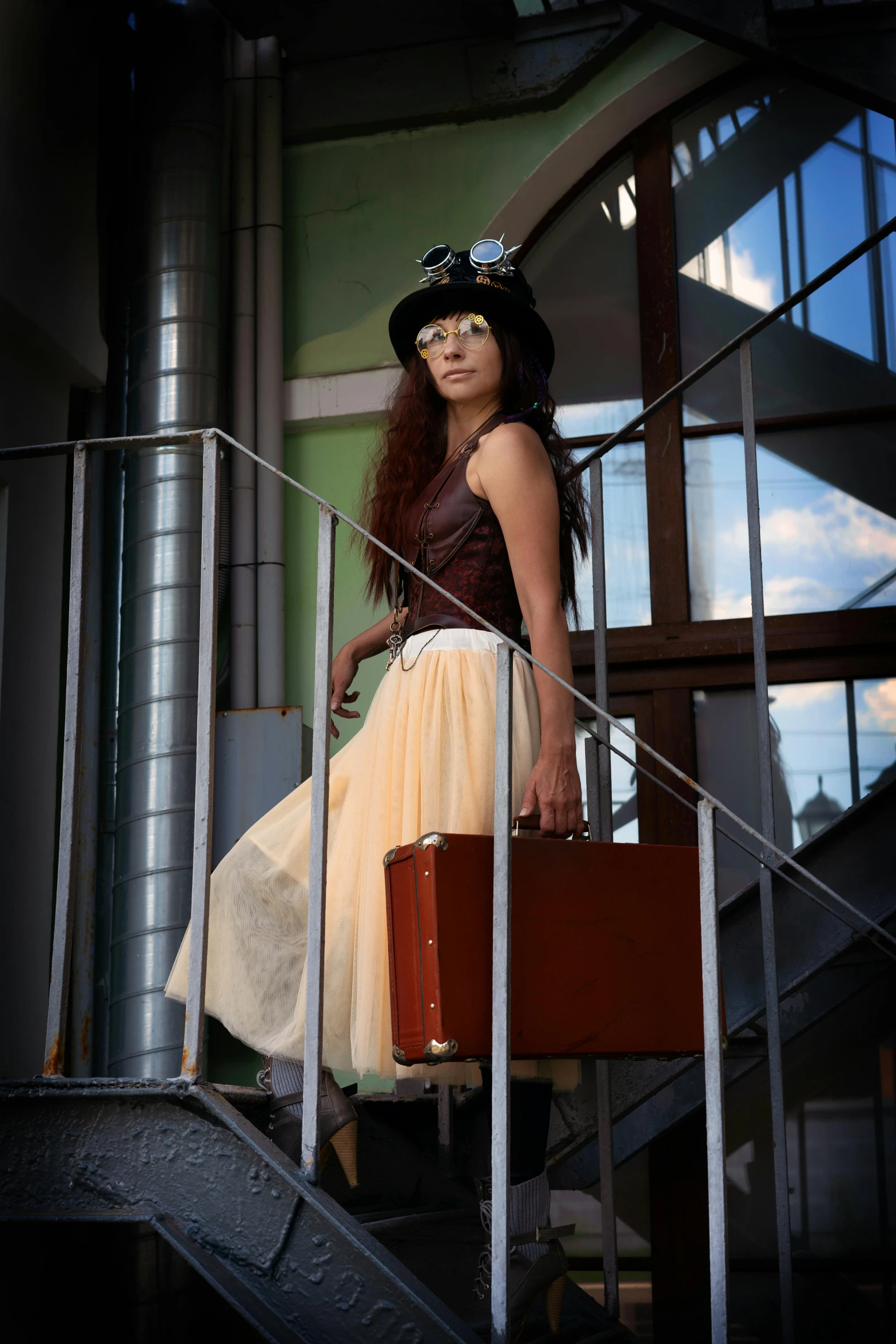 a woman standing on a set of stairs with a suitcase, by Louisa Puller, pixabay contest winner, renaissance, steampunk glasses, 7 0 mm portrait, translucent, runway