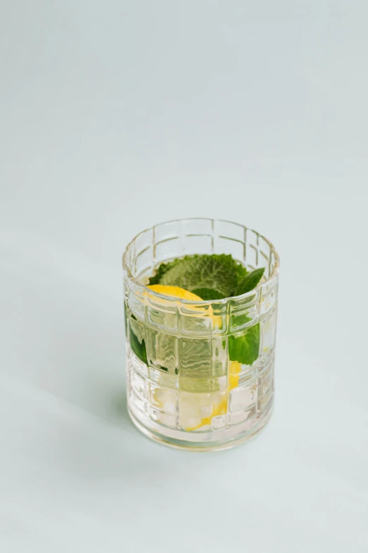 a close up of a drink in a glass on a table, grid arrangement, detailed product image, hay, front profile shot