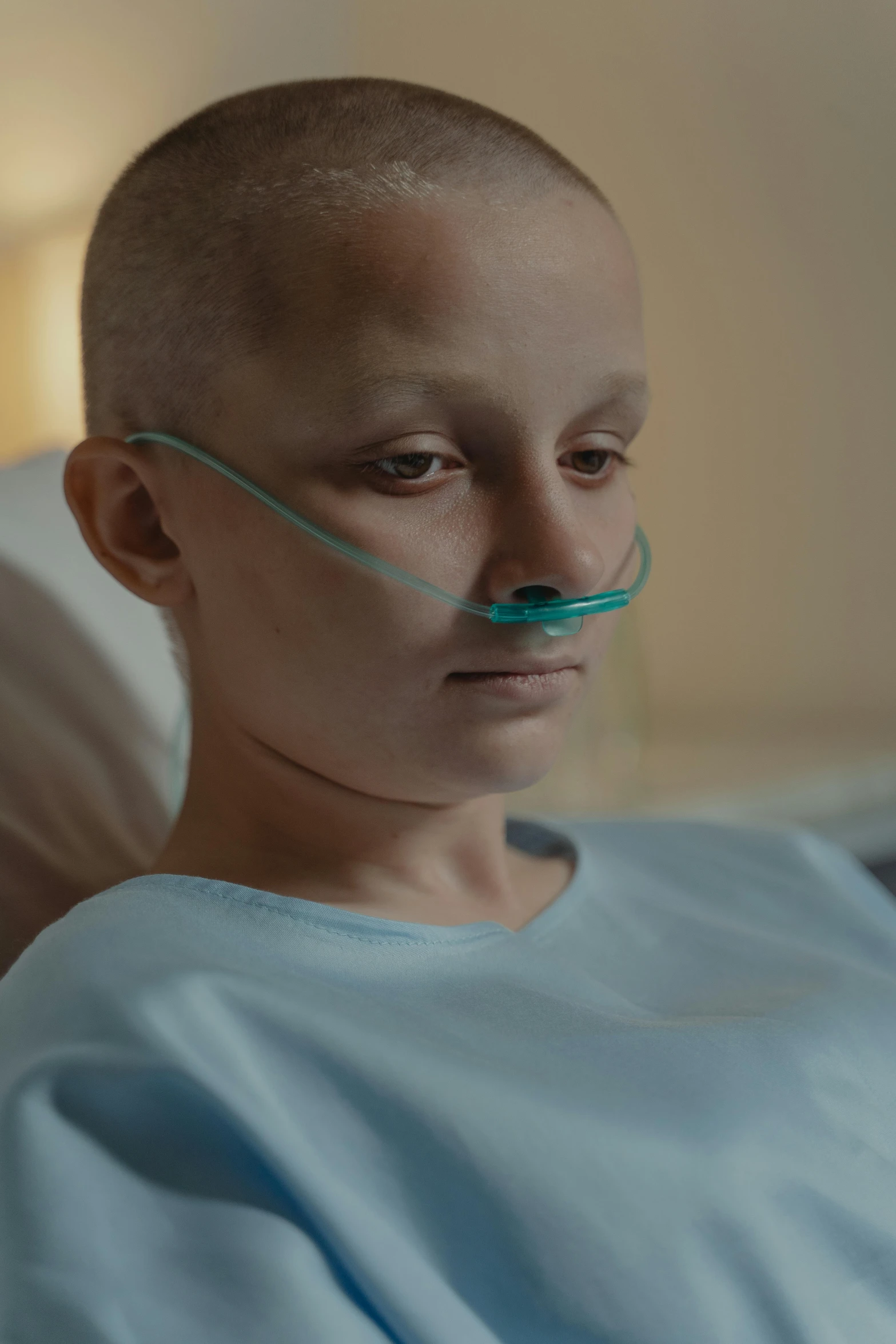 a close up of a person in a hospital bed, a portrait, happening, 2 0 2 1 cinematic 4 k framegrab, the cure for cancer, teenage girl, bald