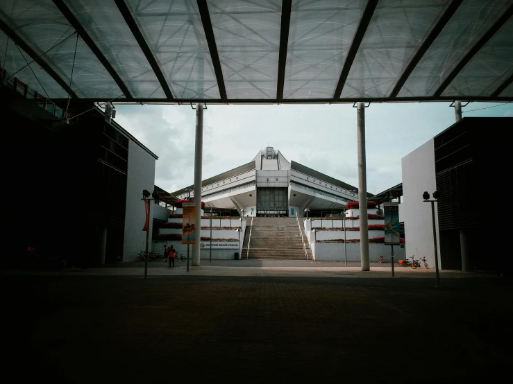 a black and white photo of a building, inspired by Thomas Struth, unsplash contest winner, soccer stadium, canopies, shaped like a yacht, set on singaporean aesthetic