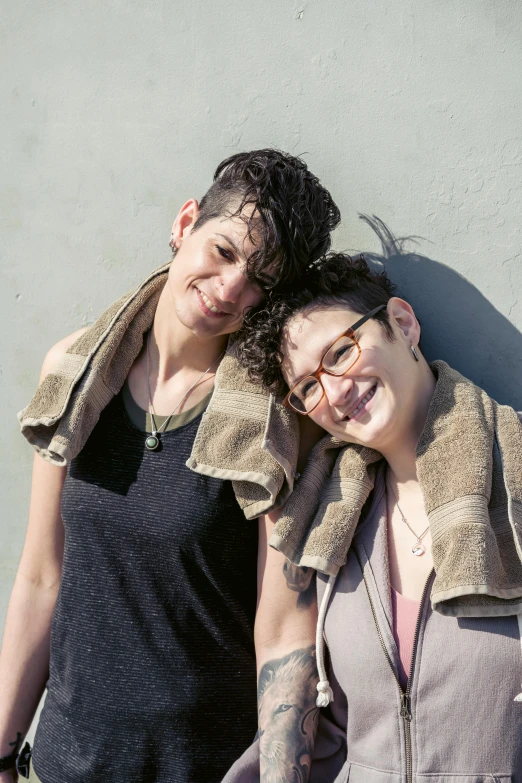 a couple of women standing next to each other, a portrait, by Harriet Zeitlin, genderless, promo image, half-body shot, yael shelbia