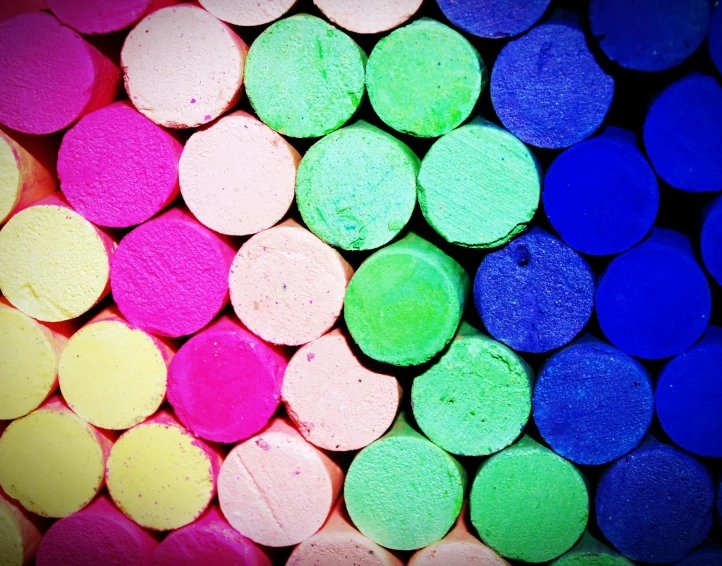 a pile of colored chalks sitting on top of a table, chalk art, flickr, crayon art, high contrast colours, instagram post, colored dots, ( ( ( colorful ) ) )