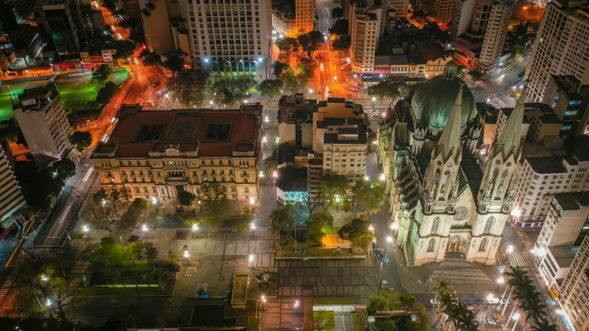 an aerial view of a city at night, by Luis Miranda, pexels contest winner, square, parce sepulto, complex background, sao