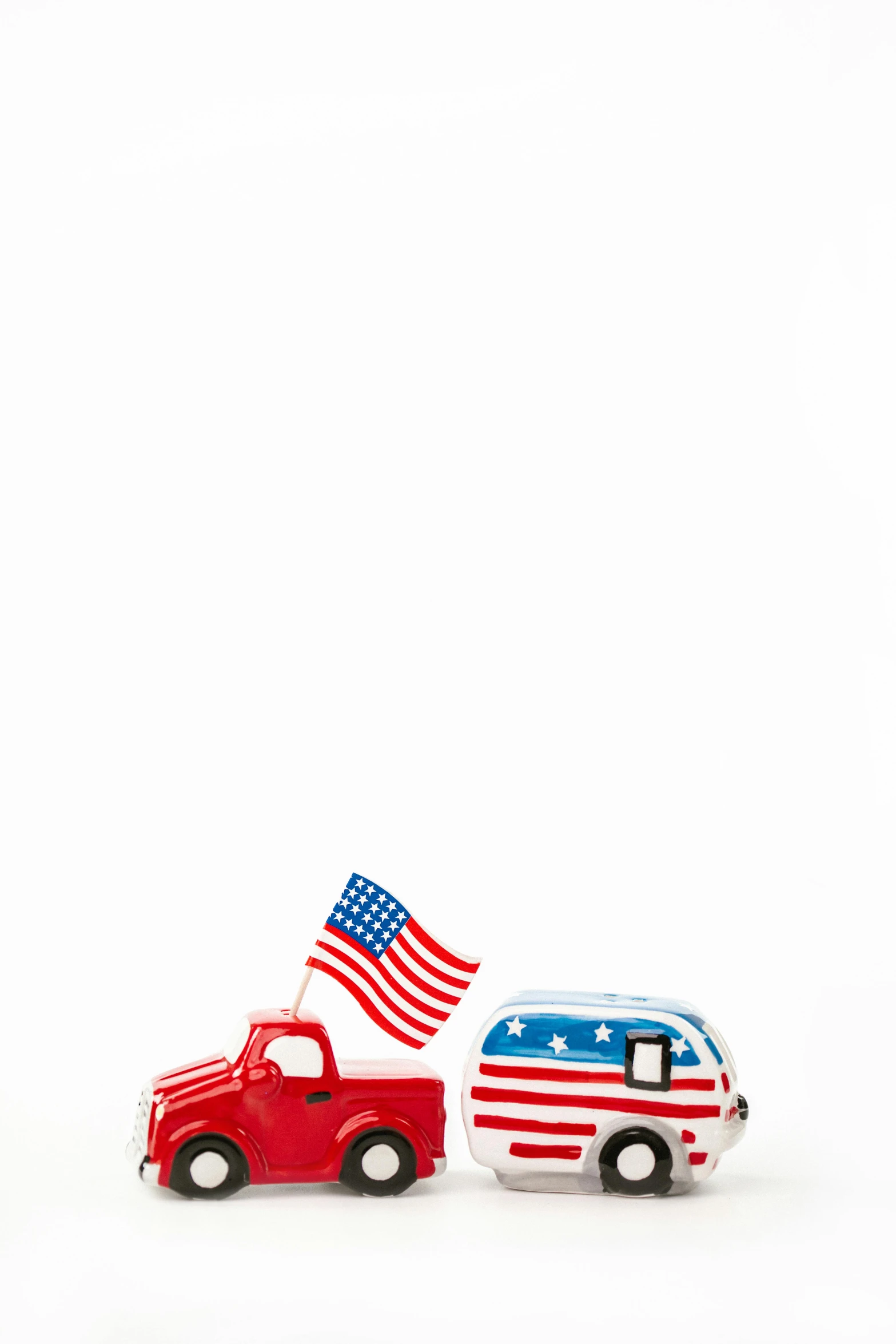 a couple of toy cars sitting next to each other, by Brian Alfred, folk art, usa flag, platon, camper, usa-sep 20