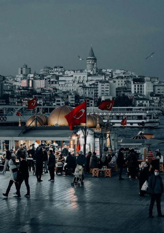a group of people standing on top of a pier, by irakli nadar, pexels contest winner, hyperrealism, busy city on background, ottoman sultan, crimson themed, 🚿🗝📝