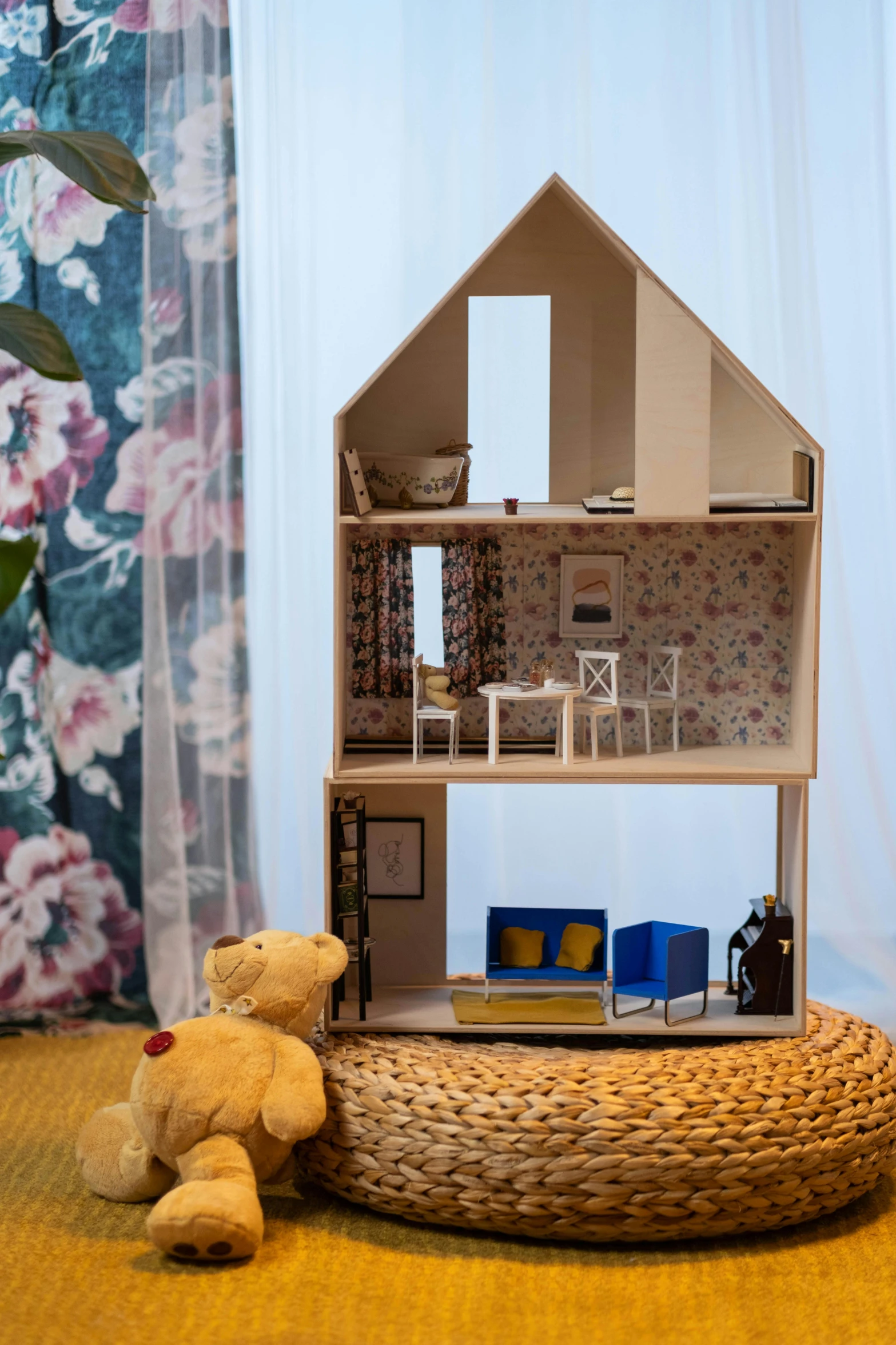 a teddy bear sitting in front of a doll house, a picture, by Zofia Stryjenska, unsplash, modernism, made of cardboard, ikea, detailed product image, interior of a small