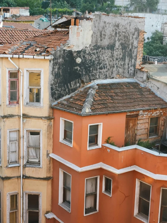 a couple of buildings that are next to each other, inspired by Niyazi Selimoglu, pexels contest winner, renaissance, dull flaking paint, istanbul, today\'s featured photograph 4k, terraced