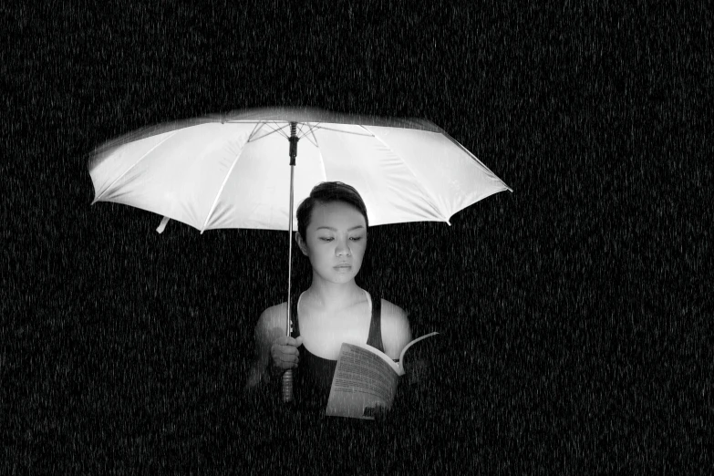 a woman reading a book under an umbrella, a black and white photo, qifeng lin, dark glowing rain, performing, composite