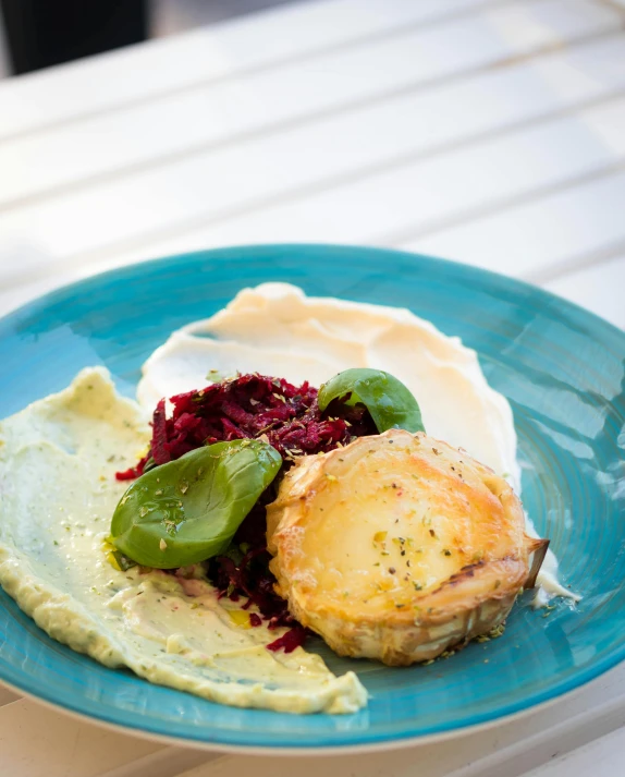 a close up of a plate of food on a table, by Alice Mason, hasbulla, mashed potatoes, seaside, green