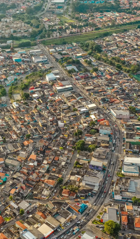 an aerial view of a city with lots of buildings, by Felipe Seade, happening, shanty townships, beautifully daylight, slide show, highresolution
