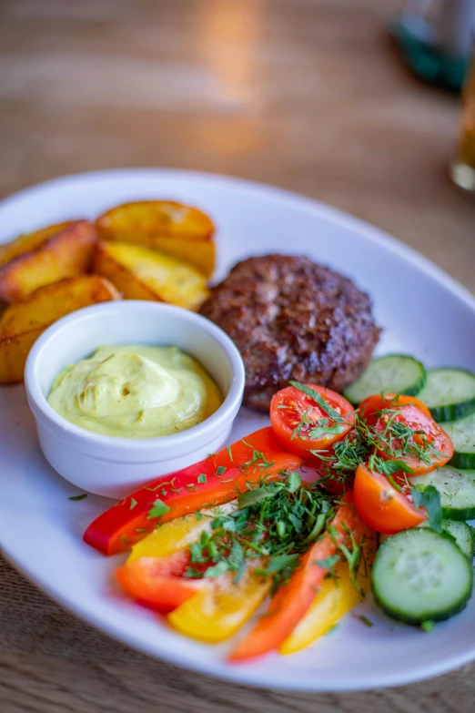 a close up of a plate of food on a table, by Tom Wänerstrand, pub, hamburger, very kenyan, salad