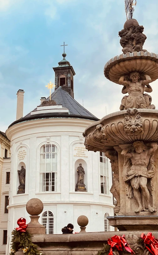 a large white building with a fountain in front of it, a statue, by Konrad Witz, art nouveau, neoclassical tower with dome, in muddy medieval village square, round-cropped, baroque marble and gold in space