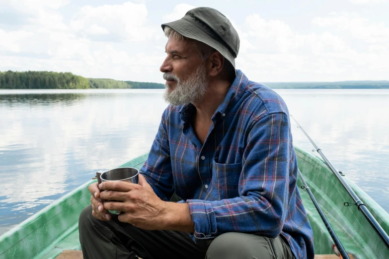 a man sitting in a boat with a cup of coffee, grey beard, man vs wild, avatar image, profile image