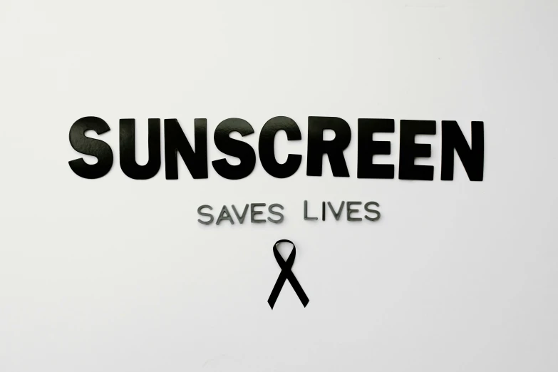 a sign that says sunscreen saves lives, an album cover, pexels, black stencil, white ribbon, wall art, background image