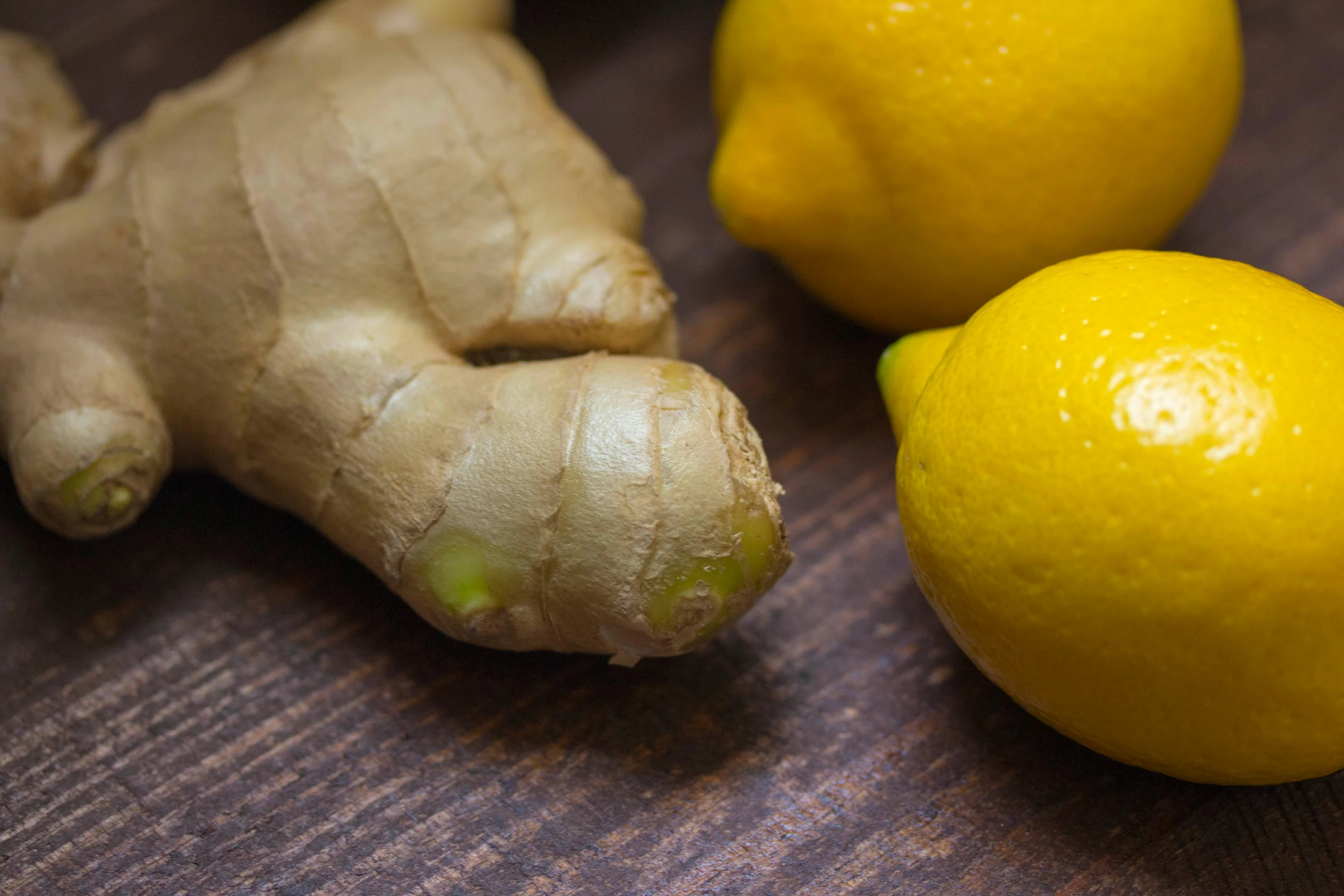 two lemons and a ginger on a table, unsplash, folds of belly flab, promo image, close up photo, various posed