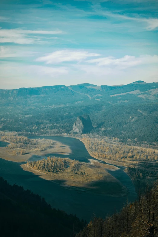 a view of a valley from the top of a mountain, a picture, inspired by Elsa Bleda, unsplash contest winner, renaissance, oregon, wide angle river, 1960s color photograph, bird\'s eye view