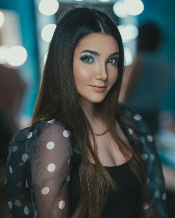 a woman with long hair posing for a picture, large eyebrows, posing for a picture