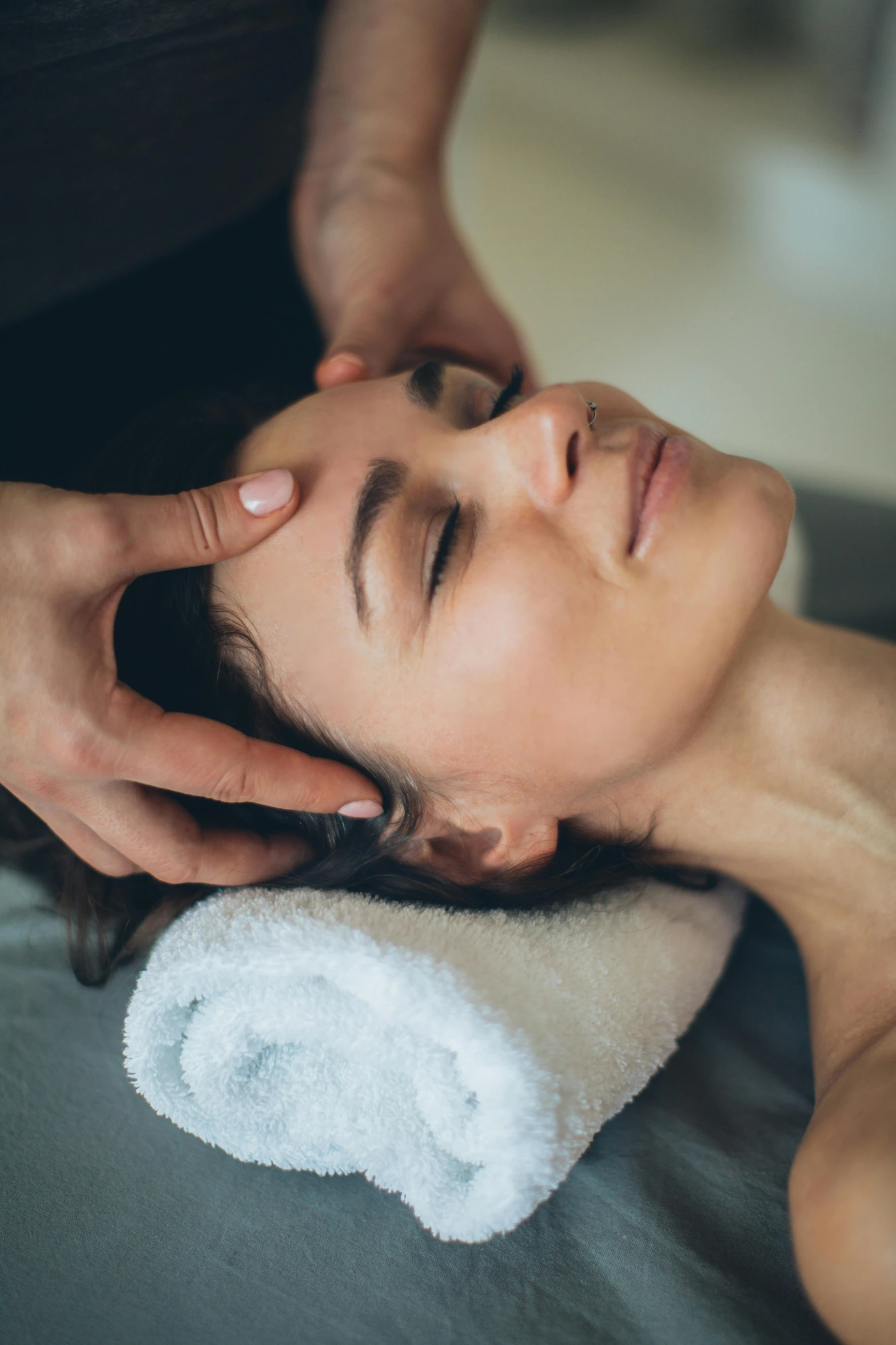 a woman getting a head massage at a spa, a portrait, trending on pexels, renaissance, paul barson, square, with a soft, thumbnail