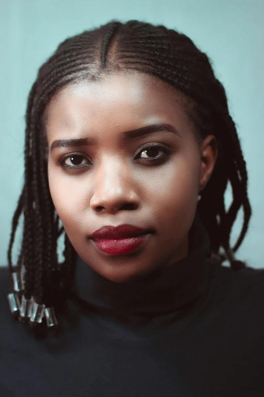 a woman with dreadlocks posing for a picture, trending on unsplash, portrait of ororo munroe, woman with braided brown hair, journalist photo, maria borges