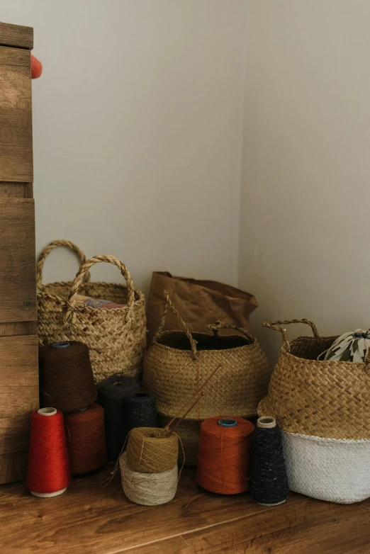 a wooden dresser sitting on top of a wooden floor, by Hannah Tompkins, trending on unsplash, pouches, woven with electricity, shelf, brown colours