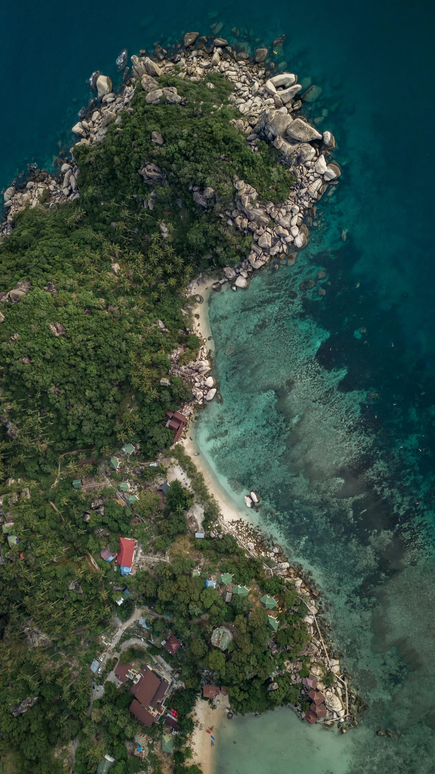 an aerial view of a small island in the middle of the ocean, by Sam Black, pexels contest winner, fishing village, thawan duchanee, looking down at the forest floor, thumbnail