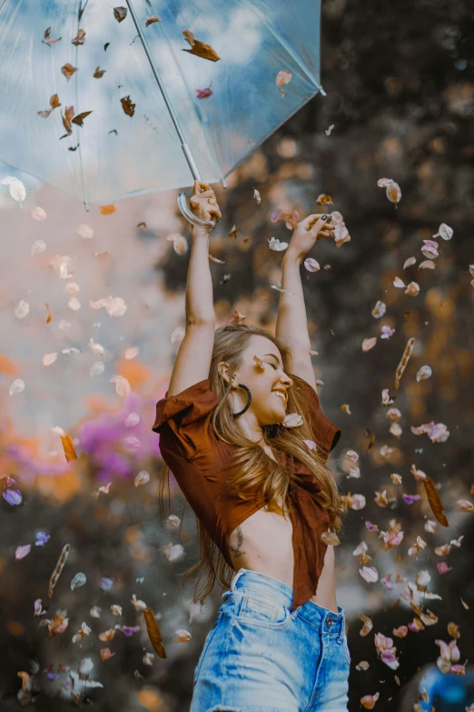 a woman holding an umbrella in the air, pexels contest winner, perky woman made of petals, unsplash 4k, a still of a happy, 5 0 0 px models