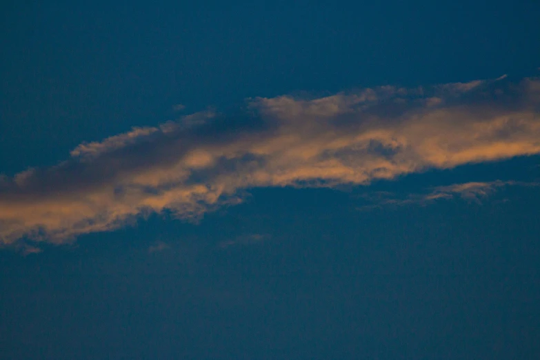 a large jetliner flying through a blue sky, inspired by Jan Rustem, romanticism, break of dawn on venus, 2 0 0 mm telephoto, today\'s featured photograph 4k, ceremonial clouds