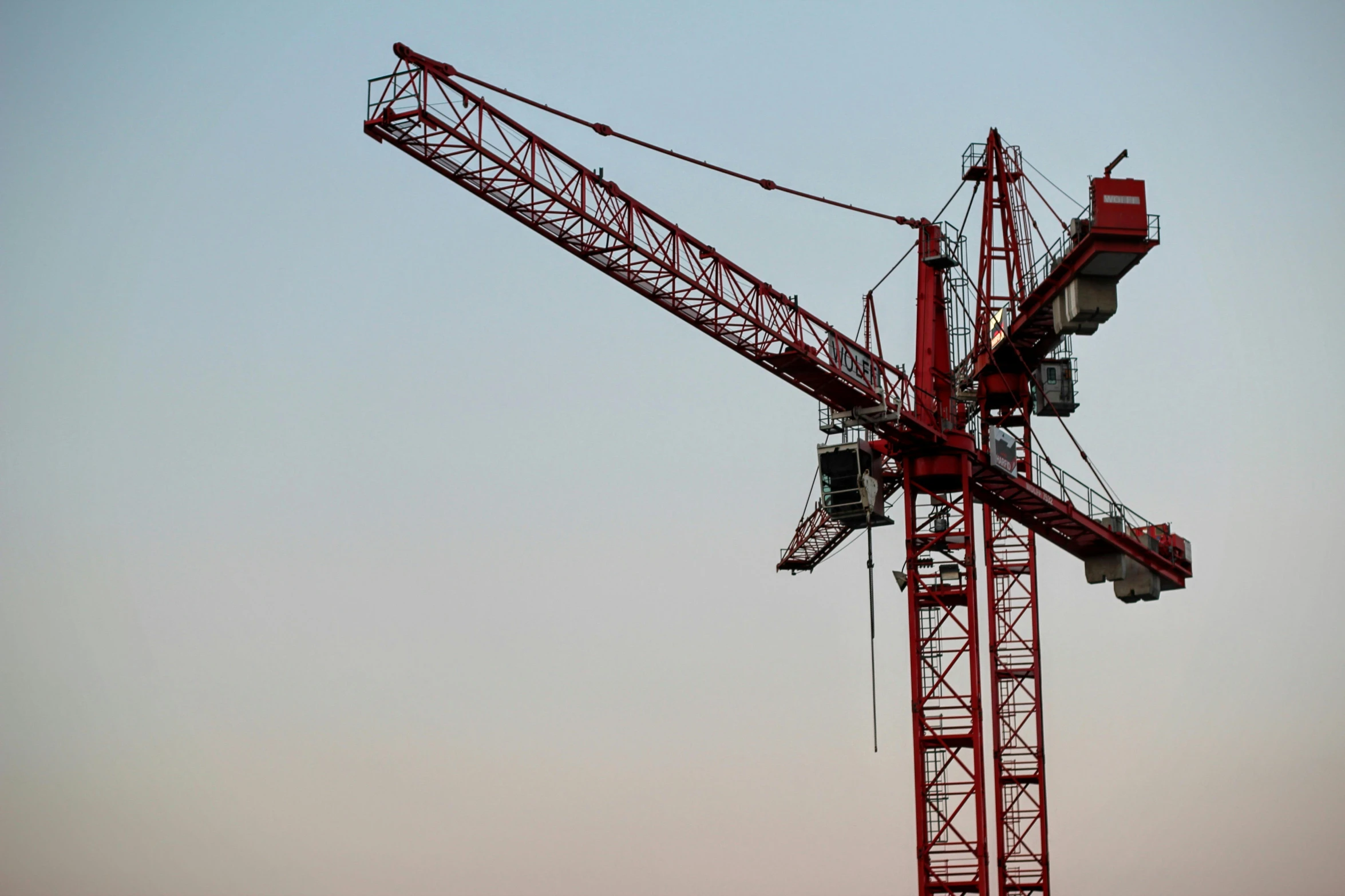 a large red crane sitting on top of a building, pexels contest winner, constructivism, ultra - detailed, close - up profile, high quality product image”, a 15 foot tall