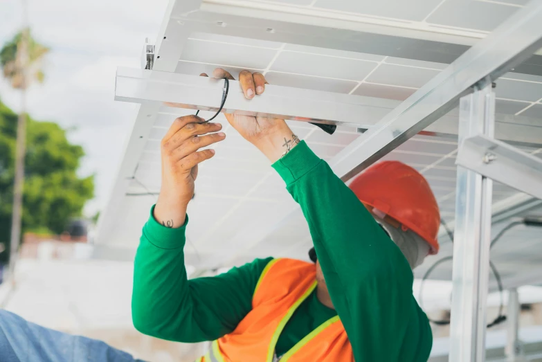 a man fixing a solar panel on a roof, pexels contest winner, bauhaus, avatar image, inspect in inventory image, awnings, worksafe. instagram photo