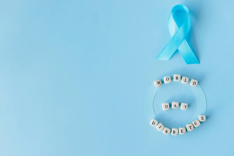 a blue ribbon and a blue ribbon on a blue background, clinically depressed, turquoise, wonder, family photo