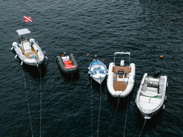 a number of boats in a body of water, pexels contest winner, figuration libre, on set, subsurface scandering, moored, premium quality