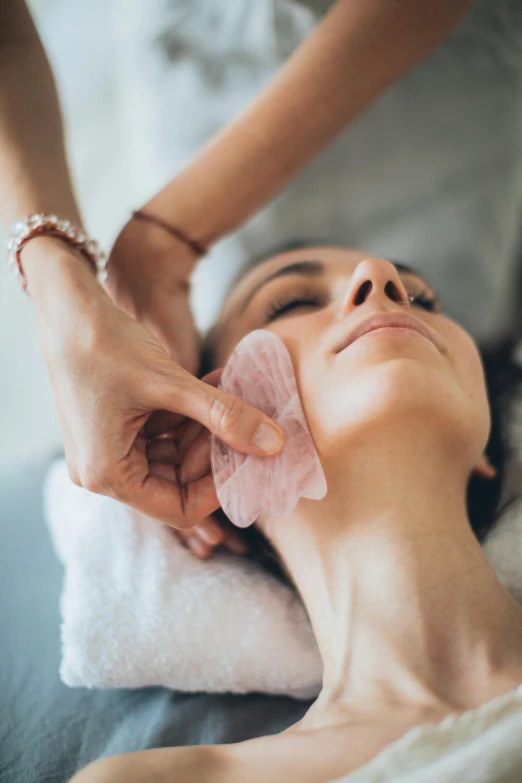 a woman getting a facial mask at a spa, by Niko Henrichon, pexels contest winner, renaissance, square, made of lab tissue, blush, neck