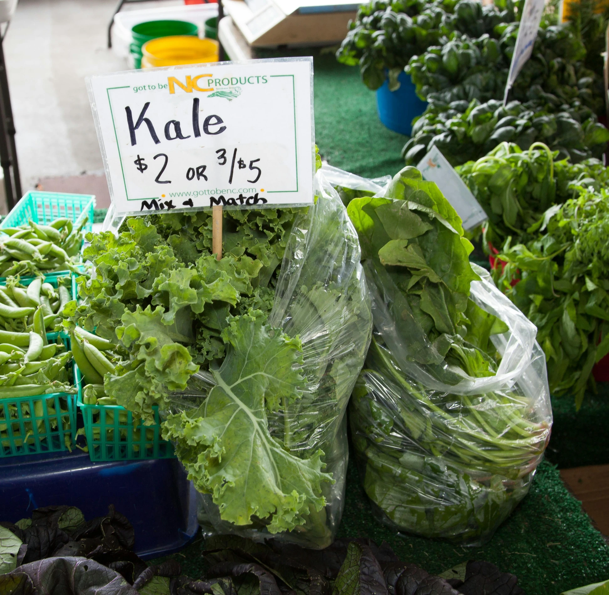 a bunch of lettuce sitting on top of a table, kete butcher, farmer's market setting, jade green, thumbnail