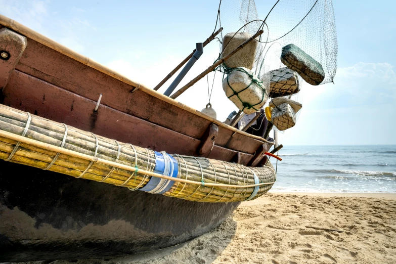 a boat sitting on top of a sandy beach, profile image, nets, sri lankan landscape, avatar image