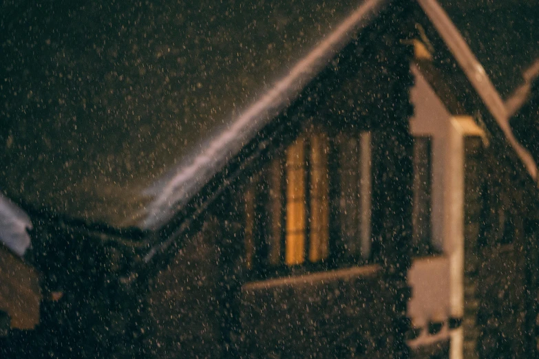 a snow covered street sign in front of a house, a picture, by Adam Marczyński, pexels contest winner, realism, it is night and raining, in an attic, grainy. poorly rated, brown