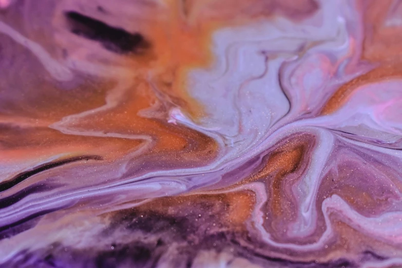 a close up of a liquid painting on a surface, by Lee Loughridge, trending on pexels, some purple and orange, nacre painting, kimberly asstyn, swirly