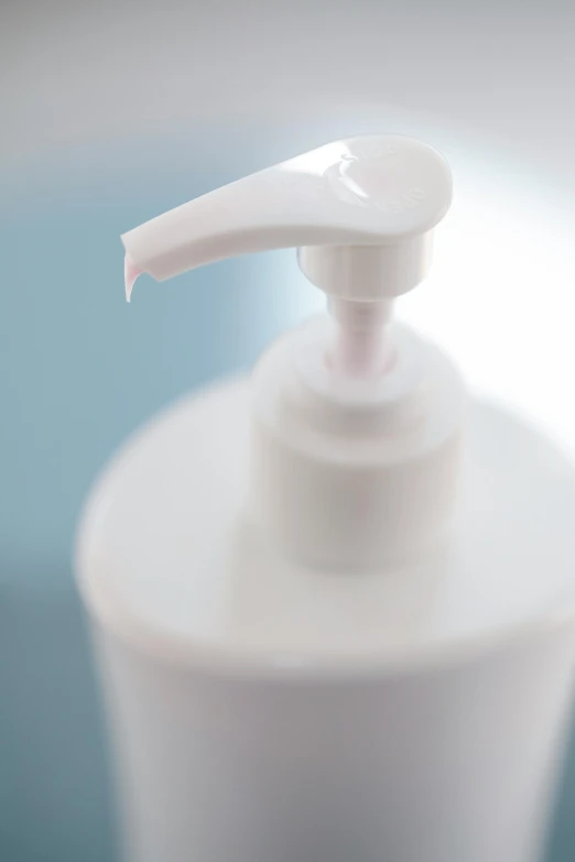 a close up of a soap dispenser on a table, plasticien, 2 0 % pearlescent detailing, surgical supplies, pearlescent white, low detail