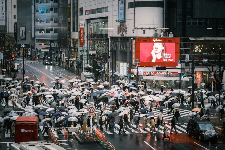 a crowd of people walking across a street holding umbrellas, a picture, unsplash contest winner, ukiyo-e, electronic billboards, 2 0 2 2 photo, youtube thumbnail, dusty abandoned shinjuku