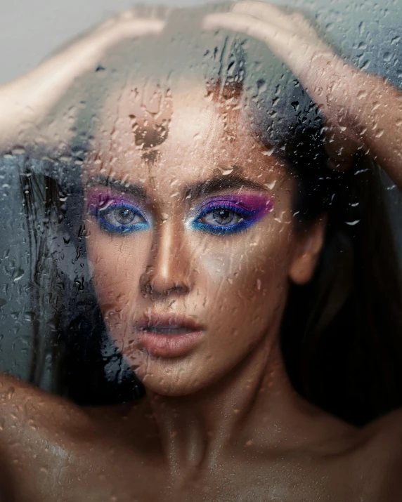 a woman that is standing in front of a window, a colorized photo, inspired by Hedi Xandt, trending on pexels, hyperrealism, covered in water drops, with professional makeup, square, roygbiv