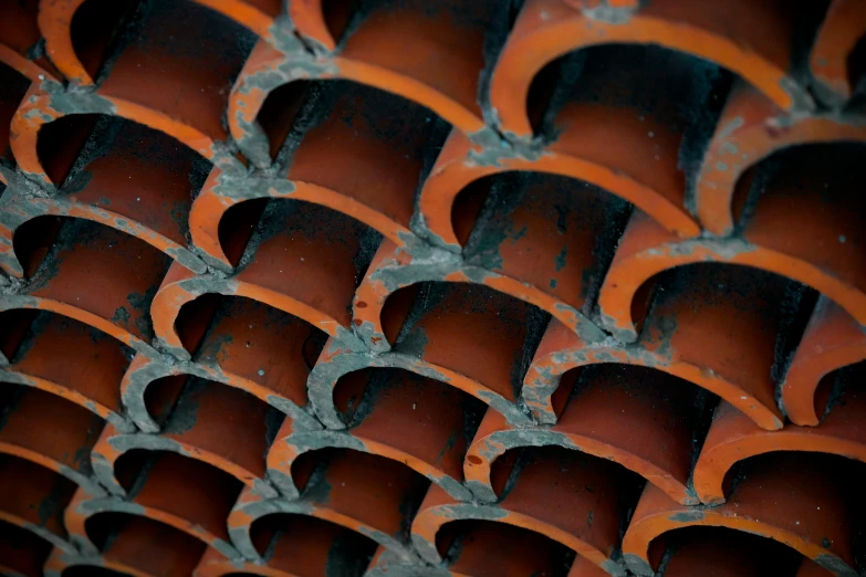 a close up of a red brick wall, inspired by Christo, pexels contest winner, plasticien, rusty pipes, 3 d mesh, smooth curvatures, dark grey and orange colours