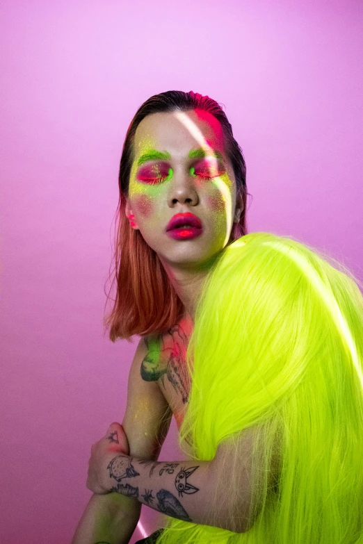 a woman with bright yellow hair and neon makeup, inspired by Elsa Bleda, trending on pexels, androgynous male, lesbians, slide show, green and pink