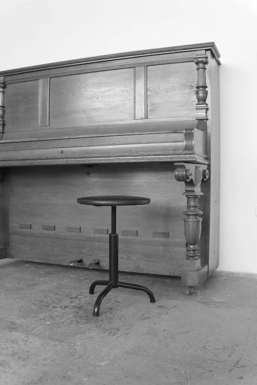 a black and white photo of a piano, an album cover, by Jan Kupecký, conceptual art, empty stools, ca. 1990, ( conceptual art )