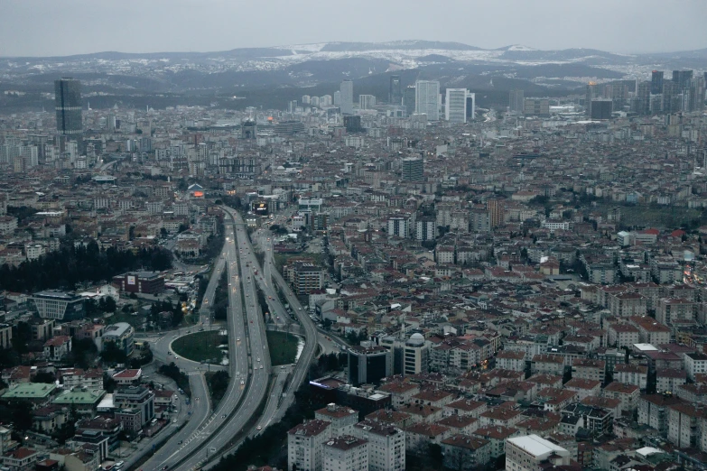 a view of a city from the top of a building, by Yasar Vurdem, pexels contest winner, hurufiyya, 8 k very hight detail, subtitles, houses and roads, istanbul