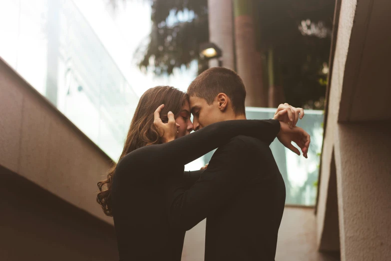 a man and a woman standing next to each other, pexels contest winner, lesbian embrace, dance, highly polished, boy and girl