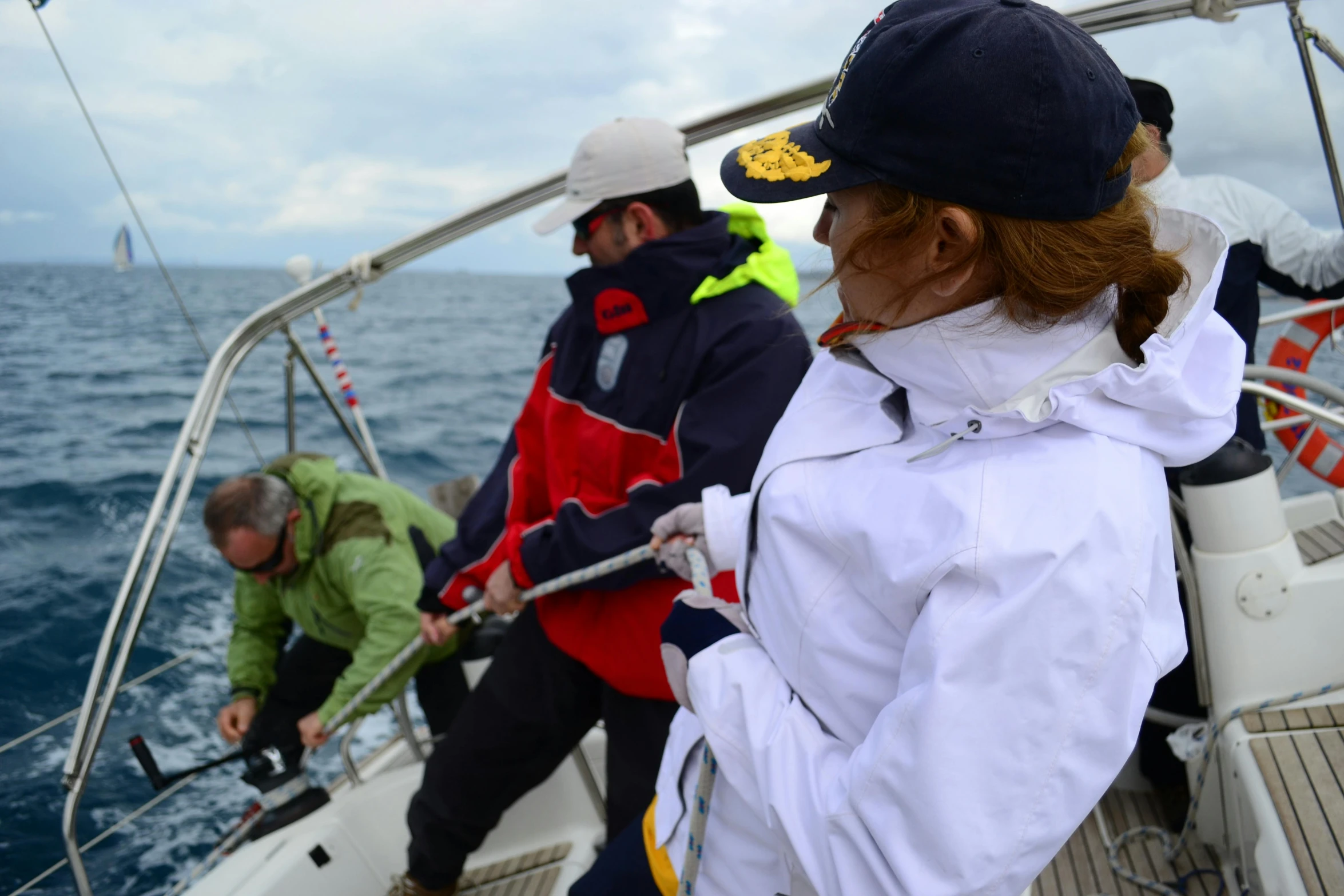 a group of people on a boat in the ocean, sailor clothing, profile image, maintenance photo, sport