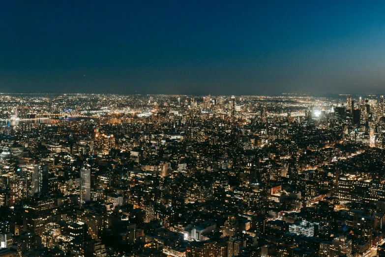 a view of a city at night from the top of a building, empire state building, unsplash 4k, panoramic, high resolution