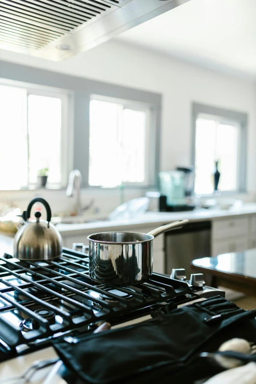 a stove top oven sitting inside of a kitchen, unsplash, house kitchen on a sunny day, wide angle”, color”