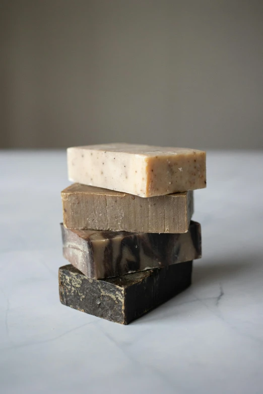 three soap bars stacked on top of each other, by Jessie Algie, dirt, 6 pack, diverse textures, petite